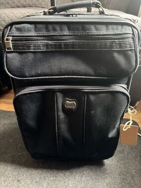 American Tourister Black Carry On suitcase